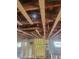 Interior view of a home under construction, showing ceiling rafters and framing at 754 Gran Kaymen Way, Apollo Beach, FL 33572