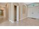 Foyer with tile flooring and coat closet at 8047 Desoto Woods Dr, Sarasota, FL 34243