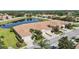 Aerial view of property showcases pond and well-manicured community at 8224 Simpson Falls Ct # 8224, Sarasota, FL 34243