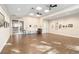 Community room featuring flexible space, wall art, and an easy access exit at 8224 Simpson Falls Ct # 8224, Sarasota, FL 34243