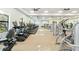 Light and airy community gym with a row of treadmills and various workout machines at 8224 Simpson Falls Ct # 8224, Sarasota, FL 34243