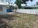 Backyard with a patio, chair, and a storage container at 8409 43Rd W Ave, Bradenton, FL 34209