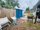 View of the backyard features a shed, patio area, and fencing at 8409 43Rd W Ave, Bradenton, FL 34209