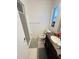 Bathroom featuring a shower and vanity with granite countertops at 8409 43Rd W Ave, Bradenton, FL 34209