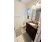 Bathroom featuring a shower and vanity with granite countertops at 8409 43Rd W Ave, Bradenton, FL 34209