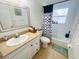 Bright bathroom featuring a tile floor, modern sink and vanity, and a shower/tub combination at 8409 43Rd W Ave, Bradenton, FL 34209