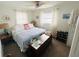 Bright bedroom featuring a ceiling fan, a large bed, and ample natural light through the windows at 8409 43Rd W Ave, Bradenton, FL 34209