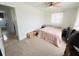 Bedroom with neutral tones, natural lighting and closet door at 8409 43Rd W Ave, Bradenton, FL 34209