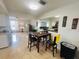 Inviting dining area adjacent to the kitchen with seating for four and lots of natural light at 8409 43Rd W Ave, Bradenton, FL 34209