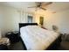 Comfortable main bedroom with natural lighting and a ceiling fan at 8409 43Rd W Ave, Bradenton, FL 34209