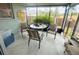 Enclosed patio with casual seating area, perfect for relaxing outdoors at 8409 43Rd W Ave, Bradenton, FL 34209