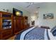 Comfortable bedroom with a queen bed and stylish decor at 915 Sw Barclay Ct, Venice, FL 34293