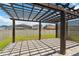 Enjoy this backyard patio with pergola, creating a cozy space perfect for outdoor entertaining and relaxation at 11194 Spring Point Cir, Riverview, FL 33579