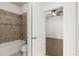 Bathroom featuring a shower/tub and decorative tile accents at 11194 Spring Point Cir, Riverview, FL 33579