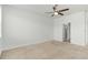 Spacious bedroom with neutral carpet, walk-in closet, and ensuite bathroom at 11194 Spring Point Cir, Riverview, FL 33579