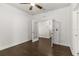Bedroom featuring hardwood flooring, and access to bathroom at 11194 Spring Point Cir, Riverview, FL 33579