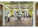 Spacious gym featuring state-of-the-art exercise equipment and multiple TVs for an engaging workout at 11194 Spring Point Cir, Riverview, FL 33579