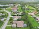 Magnificent aerial view showcasing a neighborhood with spacious homes and well-manicured lawns at 1015 143Rd Ne St, Bradenton, FL 34212