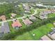 An aerial view of the homes in a beautiful community with mature trees and manicured lawns at 1015 143Rd Ne St, Bradenton, FL 34212