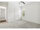 Bedroom featuring a window and closet with paneled doors at 1015 143Rd Ne St, Bradenton, FL 34212