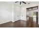 Bedroom featuring hardwood floors, closet, and ample natural light at 1015 143Rd Ne St, Bradenton, FL 34212