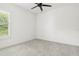 Bedroom with carpet, a window with natural light and closet at 1015 143Rd Ne St, Bradenton, FL 34212