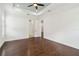 Airy bedroom features hardwood floors, recessed lighting, and an en-suite bathroom at 1015 143Rd Ne St, Bradenton, FL 34212