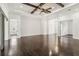 Bright, expansive living room with hardwood floors and contemporary lighting fixtures at 1015 143Rd Ne St, Bradenton, FL 34212
