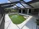 Backyard pool with caged patio area at 1036 Arden Nw Ter, Port Charlotte, FL 33948