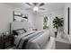 This is a bedroom with a neutral color scheme, modern furnishings, and bright natural light at 12015 Forest Park Cir, Bradenton, FL 34211