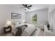This is a bedroom with a neutral color scheme, modern furnishings, and bright natural light at 12015 Forest Park Cir, Bradenton, FL 34211