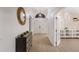 Welcoming foyer with stylish decor, wood-look flooring, and a view of the home's spacious layout at 12015 Forest Park Cir, Bradenton, FL 34211
