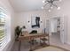 Stylish home office with modern lighting, and wood desk and shelving at 12015 Forest Park Cir, Bradenton, FL 34211