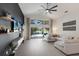 Beautiful living room with large window and view to pool and backyard at 12015 Forest Park Cir, Bradenton, FL 34211