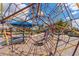 A close-up of a rope climbing structure in the community playground, providing a fun activity for  at 12015 Forest Park Cir, Bradenton, FL 34211
