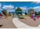 A vibrant community playground featuring a variety of play structures, offering a fun and safe environment for children at 12015 Forest Park Cir, Bradenton, FL 34211