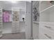 This is a spacious walk-in closet with built-in shelving and ample storage space at 12015 Forest Park Cir, Bradenton, FL 34211
