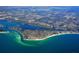 Wide aerial view showcasing the coastline and the waterways at 1203 Lyric Ln, Sarasota, FL 34242