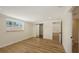 Cozy bedroom featuring wood floors and natural light at 1203 Lyric Ln, Sarasota, FL 34242