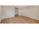Bedroom with wood floors and a closet at 1203 Lyric Ln, Sarasota, FL 34242