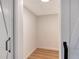 Walk in closet with light wood floors and white walls at 1203 Lyric Ln, Sarasota, FL 34242