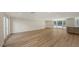 Spacious living room featuring modern flooring, recessed lighting, and multiple windows at 1203 Lyric Ln, Sarasota, FL 34242