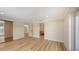 Bright main bedroom with wood floors and ensuite access at 1203 Lyric Ln, Sarasota, FL 34242