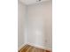 This is a room with white walls and trim and wood floors at 1203 Lyric Ln, Sarasota, FL 34242