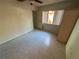 Bedroom with tile flooring, ceiling fan and natural light at 13017 Club Dr, Hudson, FL 34667