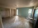 Bedroom with dual closets and a sliding door to a lanai at 13017 Club Dr, Hudson, FL 34667