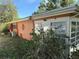Back exterior of the home at 13017 Club Dr, Hudson, FL 34667