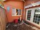 Outdoor patio with privacy fence and space for outdoor furniture at 13017 Club Dr, Hudson, FL 34667