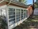 Bright sun room with multiple windows at 13017 Club Dr, Hudson, FL 34667