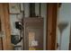 Outdated utility panel with various switches and hardware, ready for renovation at 13017 Club Dr, Hudson, FL 34667